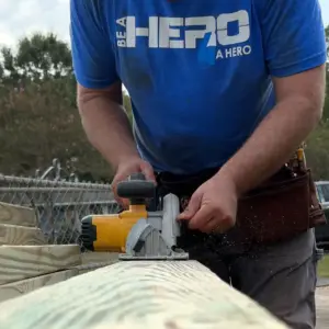 House of Heroes Volunteer Making Cuts