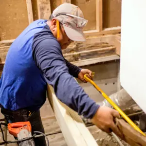 House of Heroes Volunteer Making Repairs